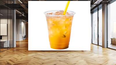 A delicious iced mango drink in a takeaway plastic cup with a yellow straw on an isolated background Wall mural