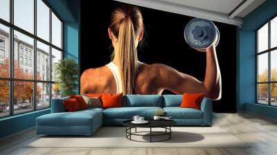 Fitness girl - attractive young woman working out with dumbbells in fitness gym - conceptual image for healthy lifestyle Wall mural