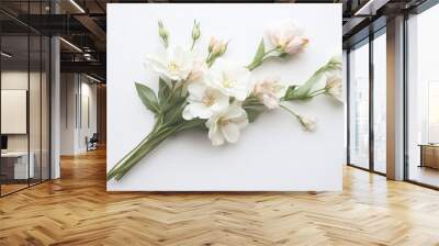 A bouquet of meaningful flowers, displayed on a simple white background, representing deep emotions of care, love, and remembrance Wall mural