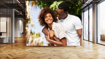 Outdoor protrait of black african american couple embracing each other Wall mural