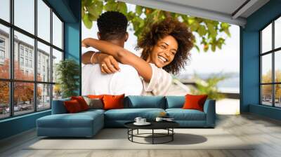 Outdoor protrait of black african american couple embracing each other Wall mural