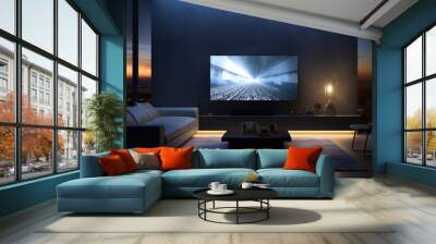 A blank TV screen is shown in a contemporary dark room with a gray sofa. The TV is situated in the living room. Wall mural