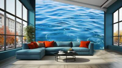 Beautiful light reflections in a crystal clear transparent water surface in a blue hue is a beautiful background Wall mural