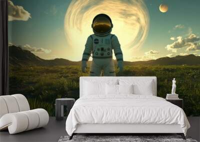 Astronaut standing in a field with a swirling light in the sky. Wall mural