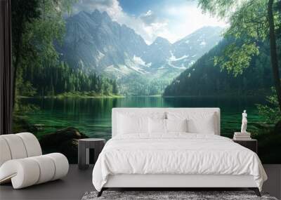 Tranquil mountain lake with clear water and lush green trees under a bright blue sky. Wall mural