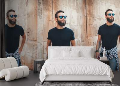 Collage of photos with young bearded guy in blank black t-shirt. Design men t shirt mock-up for print Wall mural