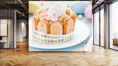 Traditional Easter treats for the kids on festive decorated tabl Wall mural