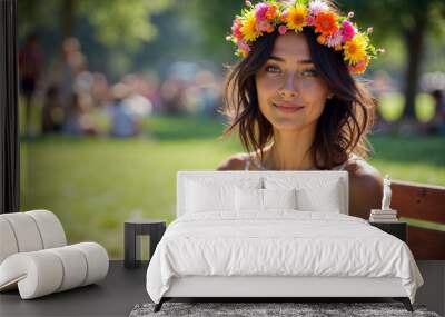 A young Caucasian woman with long brown hair wearing a flower crown, smiling in a grassy outdoor setting Wall mural