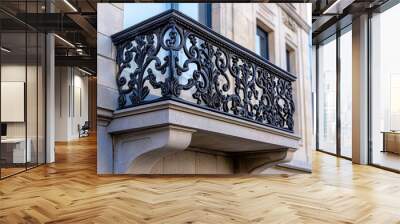 A close-up of a decorative wrought iron balcony, attached to a historic building in a European city Wall mural