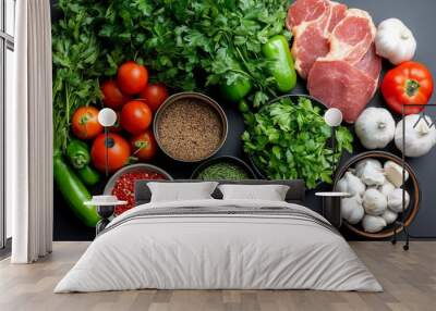 A table full of fresh ingredients, including herbs, spices, vegetables, and meats, ready for a cooking session Wall mural