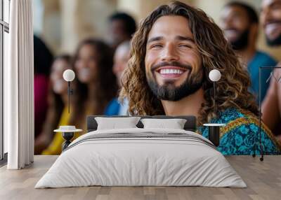 Jesus surrounded by a diverse group of people, smiling as they listen to His teachings, representing His message of love for all mankind Wall mural