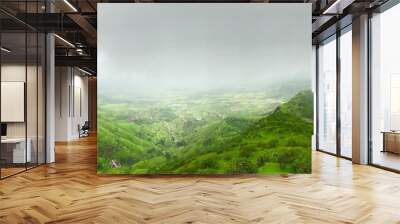  Green landscape surrounded by hills, mountains in monsoon season  Wall mural