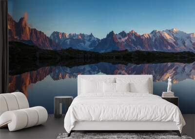 Panorama of the Mont Blanc massif reflected in Lac de Chesery during sunset. Chamonix, France. Wall mural