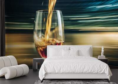 A glass of red wine on a motion-blurred background. Wall mural