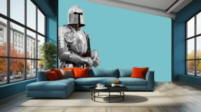 Knight in shiny metal armor. Reliable security and insurance. Copy space. Wall mural