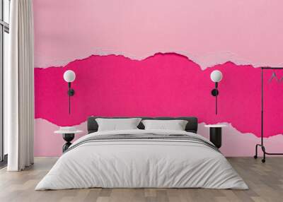 Torn pink paper on dark pink background. Space for text. Wall mural