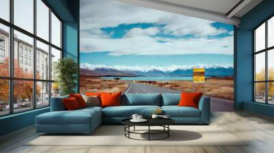 'Zealand New Zealand State ; arrival Tekapo Tekapo April New Highway sign Lake Information Water Sky Travel Banner Nature Grass Landscape Road Clouds Mountain Blue Sign Law Vacation Trees Lake River' Wall mural