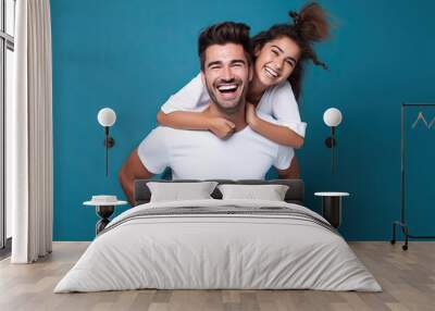 background blue isolated jeans denim tshirt white wearing piggyback laughing people cheerful Portrait beautiful dream care carefree children childhood content father daughter day embracing Wall mural