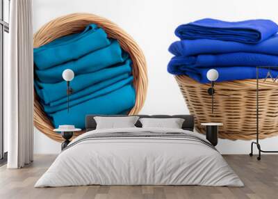 2 Set of dark light blue neatly folded clean laundry clothes in round circle wicker basket, front top view on transparent background cutout PNG. Mockup template for artwork design Wall mural