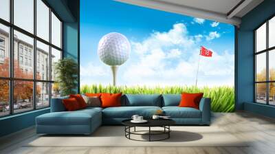 Golf ball with tee in the grass Wall mural