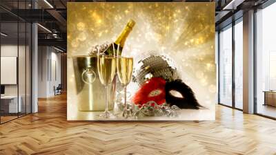 two glasses of champagne against festive gold background Wall mural