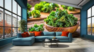 Healthy Kale Chips on Wooden Table - A Delicious Snack for Healthy Eating Enthusiasts Wall mural