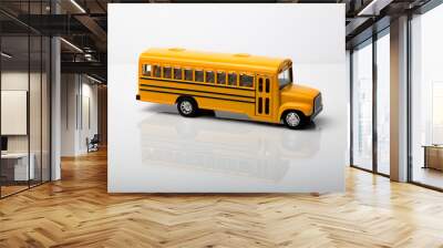 Scale school truck in yellow color on white background. Wall mural