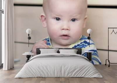 Child playing with wooden toys Wall mural