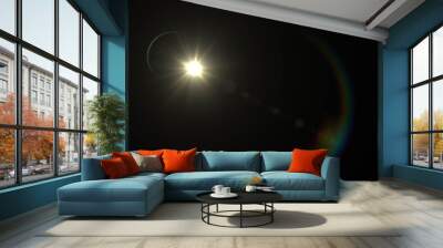 Lens flare  glow light effect  on black background. Easy to add overlay or screen filter over photos  Wall mural