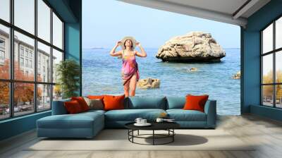 woman on the beach on vacation Wall mural