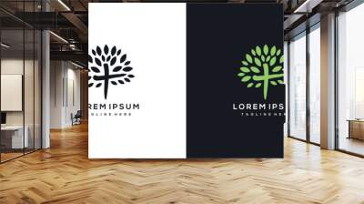 Christian Cross Church logo design vector illustration. cross logo with leaves around it Wall mural