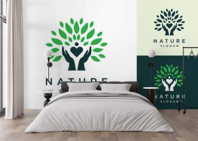 Nature hand logo design template. Leaf and hand nature logo design inspiration Wall mural