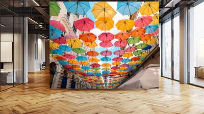 Colorful umbrellas street Strada Alba Iulia in Timisoara, Romania Wall mural