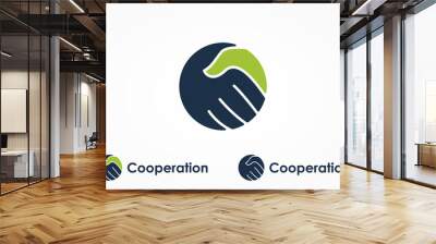 Handshake Logo. Two Hands Make a Deal in Blue and Green Circle Shape isolated on White Background. Usable for Business and Cooperation Logos. Flat Vector Logo Design Template Element. Wall mural