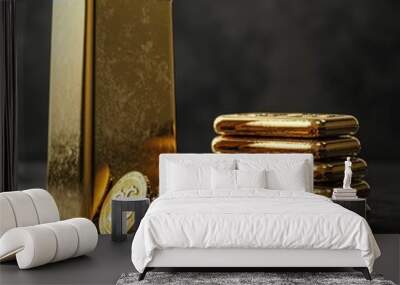 A gold bar sits on a table with a pile of coins and a few other gold bars Wall mural