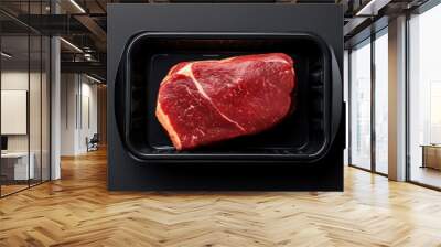 Marbled beef in black plastic packaging, transparent window, branding sticker area, top-down shot Wall mural