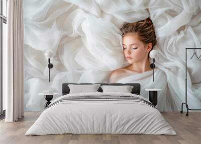 Serene Portrait of Girl in White Draped Fabric Wall mural