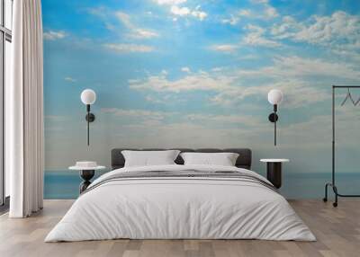 Calm weather on sea or ocean with clouds Wall mural