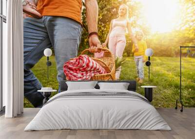 Cheerful family on vacation enjoying outdoors Wall mural