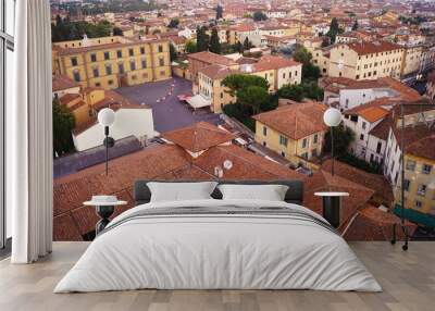 Aerial view from the leaning tower of the city of Pisa at sunset, Tuscany, Italy Wall mural