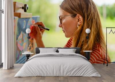 Artist woman with a painting Wall mural