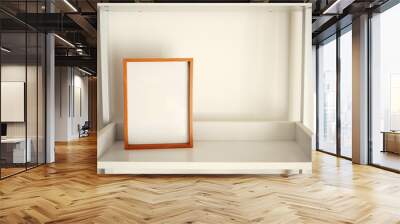 blank decorative picture frame on a clean shelf Wall mural