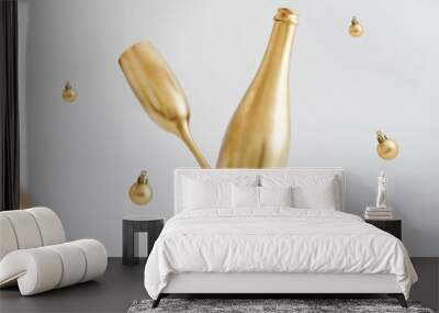 Party New Year background with gold champagne bottle, flying xmas baubles and glass of wine. Creative abstract design with realistic 3d festive objects. 3d rendering. Wall mural