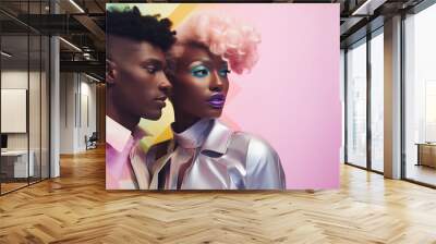 Young Afro-American female and male model posing. Fashionable couple in love in elegant contemporary clothes. Colorful background. Wall mural