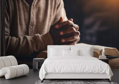 hands together in prayer to God along with open bible Wall mural