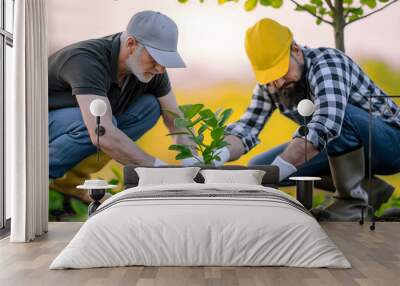 Two men planting a tree Wall mural