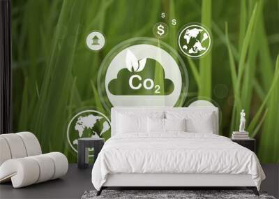 Reduce CO2 emission concept. Clean and friendly environment without carbon dioxide emissions.CO2 reducing icon inside magnifier glass for carbon credit to limit global warming from climate change Wall mural