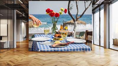 Beautiful romantic table  on the  beach Wall mural