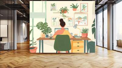 Cozy home office with a desk, laptop, and plants, showing a freelancer working on projects, engaged in a video call Wall mural