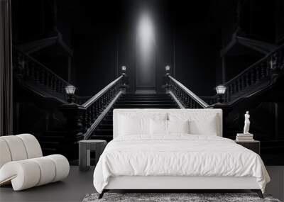 An abstract composition of a single light illuminating the symmetry of a dark staircase at night, creating an alluring contrast between the monochrome black and white lines Wall mural